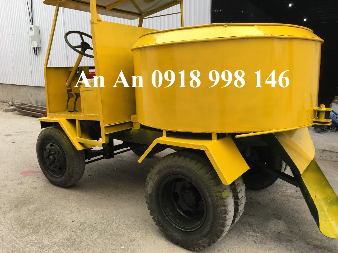 máy trộn bê tông tự hành 9 bao 1 cầu.jpg