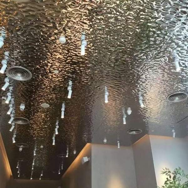 Thi công inox 3d sóng nước giá rẻ2.jpg